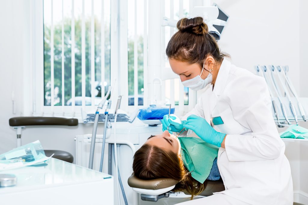 patient and dentist during dental treatment